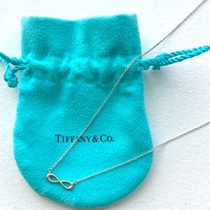 Tiffany infinity necklace with original pouch.